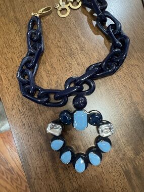 Statement necklace in blues add flair to denim or summer white